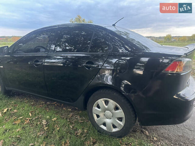 Черный Мицубиси Лансер, объемом двигателя 1.5 л и пробегом 202 тыс. км за 6500 $, фото 10 на Automoto.ua