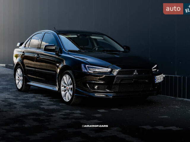 Чорний Міцубісі Lancer, об'ємом двигуна 2 л та пробігом 204 тис. км за 9500 $, фото 2 на Automoto.ua