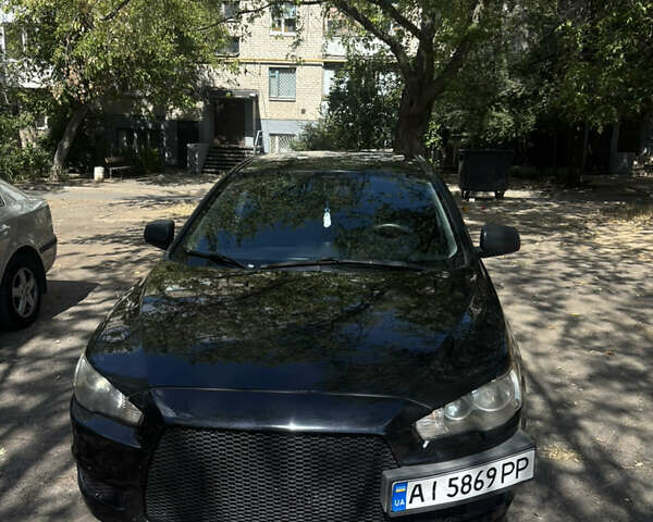 Черный Мицубиси Лансер, объемом двигателя 1.5 л и пробегом 167 тыс. км за 6800 $, фото 1 на Automoto.ua