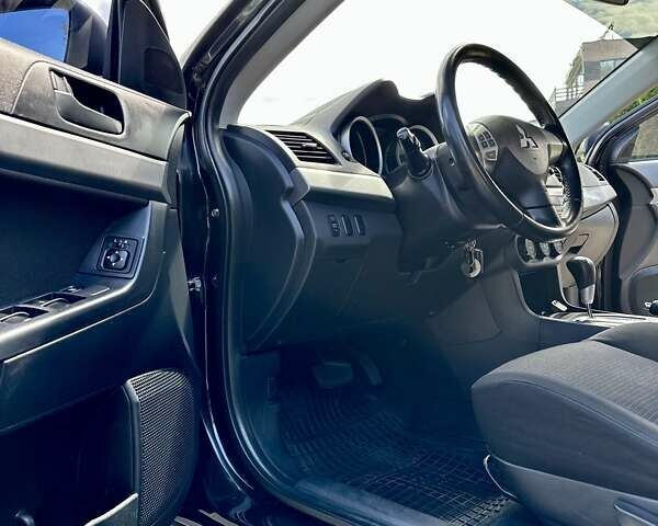 Чорний Міцубісі Lancer, об'ємом двигуна 1.5 л та пробігом 187 тис. км за 6800 $, фото 16 на Automoto.ua