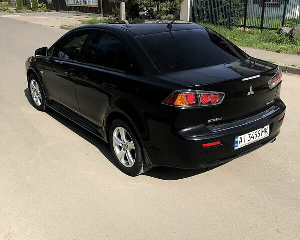 Чорний Міцубісі Lancer, об'ємом двигуна 1.5 л та пробігом 131 тис. км за 8000 $, фото 6 на Automoto.ua