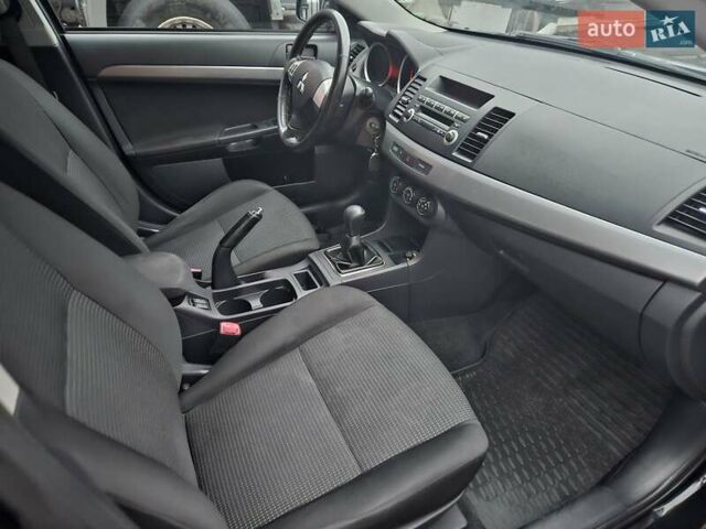 Черный Мицубиси Лансер, объемом двигателя 1.5 л и пробегом 222 тыс. км за 4900 $, фото 11 на Automoto.ua