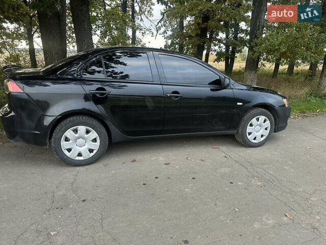 Черный Мицубиси Лансер, объемом двигателя 1.5 л и пробегом 202 тыс. км за 6500 $, фото 6 на Automoto.ua