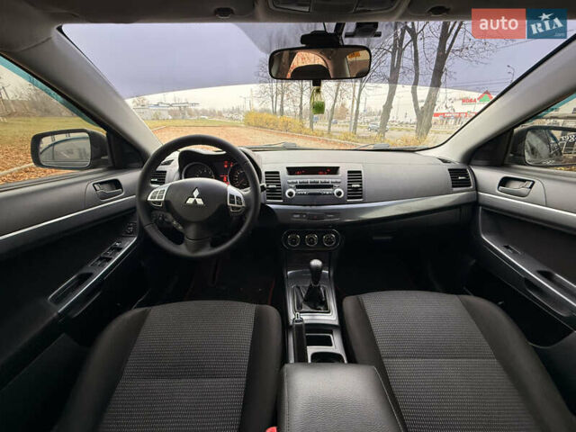 Черный Мицубиси Лансер, объемом двигателя 2 л и пробегом 169 тыс. км за 6800 $, фото 34 на Automoto.ua