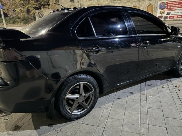 Чорний Міцубісі Lancer, об'ємом двигуна 1.5 л та пробігом 244 тис. км за 4700 $, фото 2 на Automoto.ua