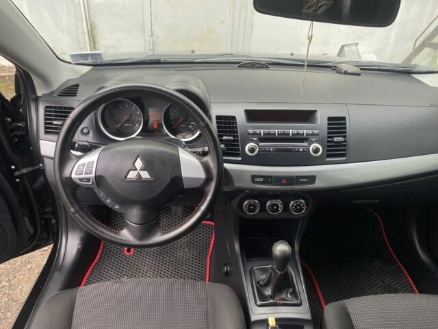 Міцубісі Lancer 2011 у Полтаві на Automoto.ua Чорний Міцубісі Lancer, об'ємом двигуна 1.5 л та пробігом 240 тис. км за 6300 $, фото 5 на Automoto.ua