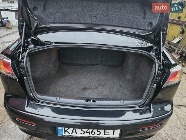 Черный Мицубиси Лансер, объемом двигателя 1.5 л и пробегом 222 тыс. км за 4900 $, фото 26 на Automoto.ua