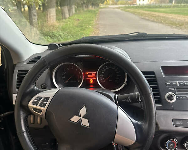 Черный Мицубиси Лансер, объемом двигателя 1.5 л и пробегом 202 тыс. км за 6500 $, фото 36 на Automoto.ua