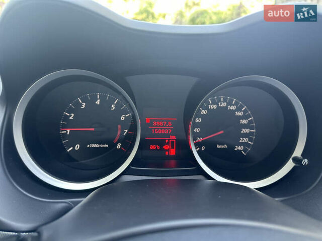 Черный Мицубиси Лансер, объемом двигателя 2 л и пробегом 158 тыс. км за 10800 $, фото 8 на Automoto.ua
