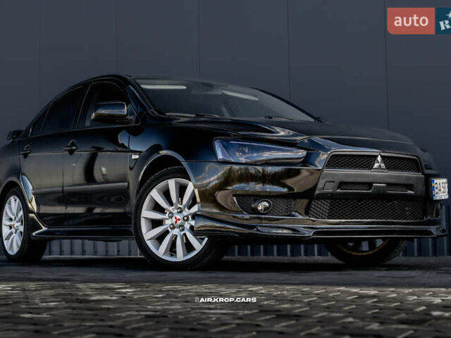 Чорний Міцубісі Lancer, об'ємом двигуна 2 л та пробігом 204 тис. км за 9500 $, фото 11 на Automoto.ua