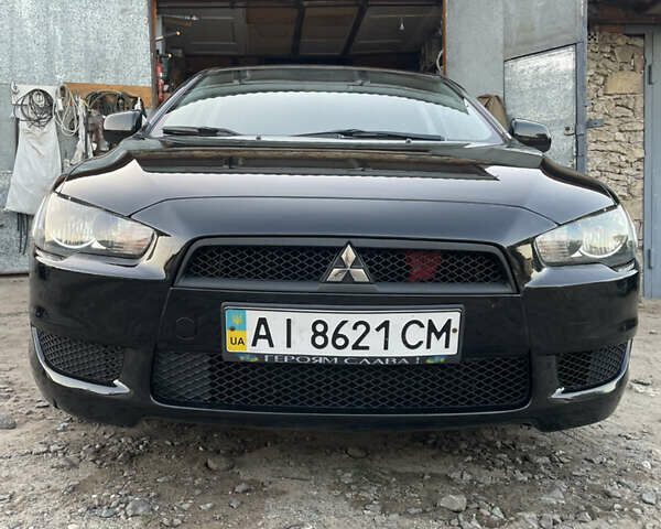 Черный Мицубиси Лансер, объемом двигателя 1.5 л и пробегом 258 тыс. км за 5550 $, фото 2 на Automoto.ua