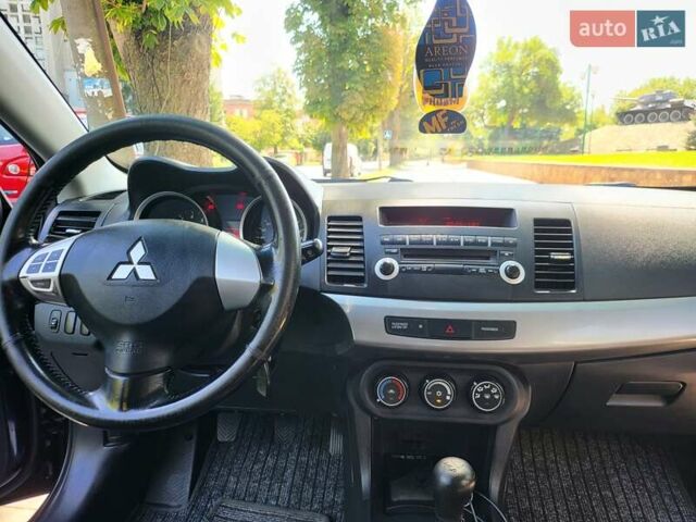 Чорний Міцубісі Lancer, об'ємом двигуна 1.5 л та пробігом 185 тис. км за 7300 $, фото 16 на Automoto.ua