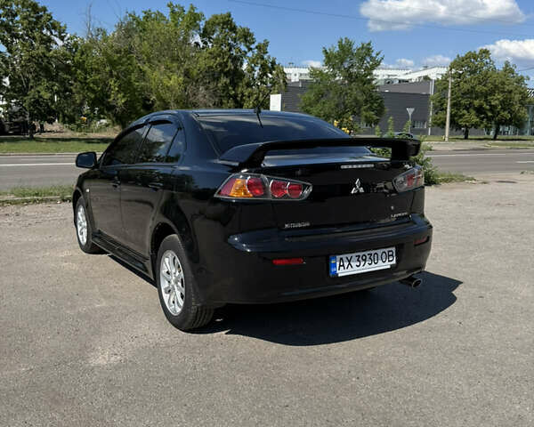 Черный Мицубиси Лансер, объемом двигателя 1.5 л и пробегом 230 тыс. км за 5400 $, фото 2 на Automoto.ua