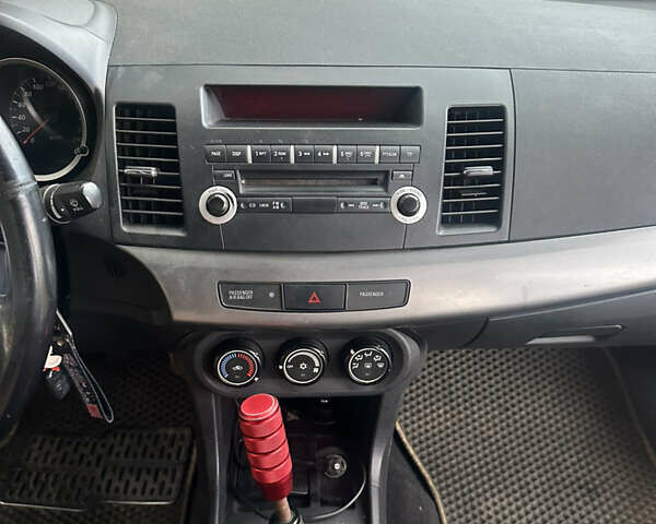 Черный Мицубиси Лансер, объемом двигателя 1.5 л и пробегом 202 тыс. км за 6500 $, фото 40 на Automoto.ua