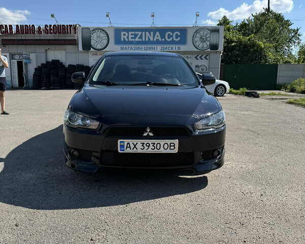 Черный Мицубиси Лансер, объемом двигателя 1.5 л и пробегом 230 тыс. км за 5400 $, фото 4 на Automoto.ua