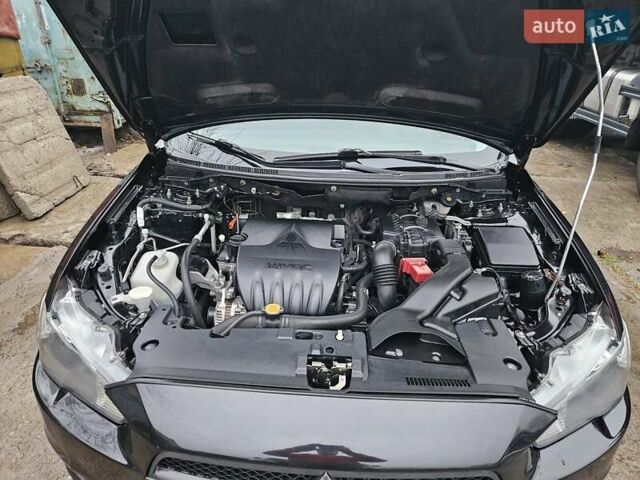 Черный Мицубиси Лансер, объемом двигателя 1.5 л и пробегом 222 тыс. км за 4900 $, фото 8 на Automoto.ua