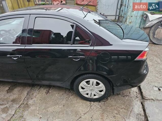 Черный Мицубиси Лансер, объемом двигателя 1.5 л и пробегом 222 тыс. км за 4900 $, фото 4 на Automoto.ua