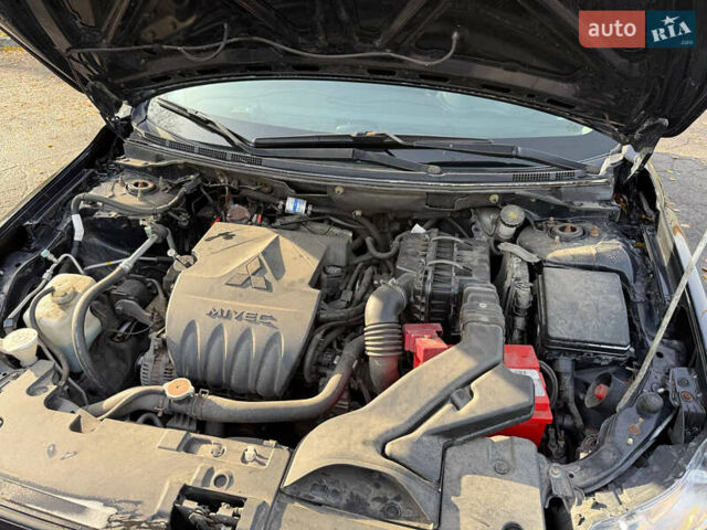 Мицубиси Лансер 2011 в Полтаве на Automoto.ua Черный Мицубиси Лансер, объемом двигателя 1.5 л и пробегом 246 тыс. км за 6300 $, фото 9 на Automoto.ua