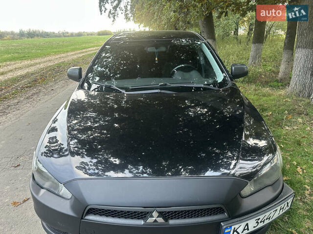 Черный Мицубиси Лансер, объемом двигателя 1.5 л и пробегом 202 тыс. км за 6500 $, фото 16 на Automoto.ua