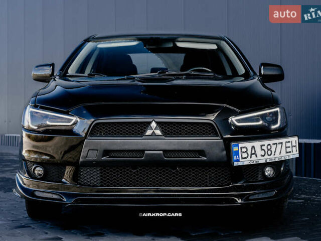 Чорний Міцубісі Lancer, об'ємом двигуна 2 л та пробігом 204 тис. км за 9500 $, фото 19 на Automoto.ua