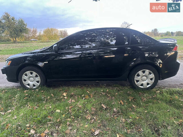 Черный Мицубиси Лансер, объемом двигателя 1.5 л и пробегом 202 тыс. км за 6500 $, фото 8 на Automoto.ua