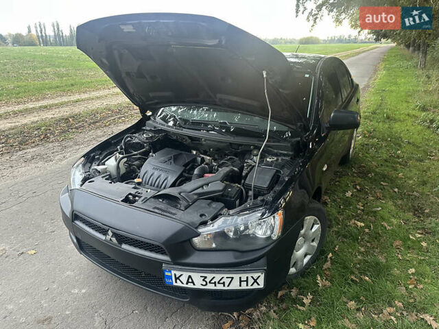Черный Мицубиси Лансер, объемом двигателя 1.5 л и пробегом 202 тыс. км за 6500 $, фото 43 на Automoto.ua