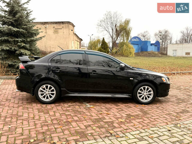 Черный Мицубиси Лансер, объемом двигателя 2 л и пробегом 169 тыс. км за 6800 $, фото 21 на Automoto.ua