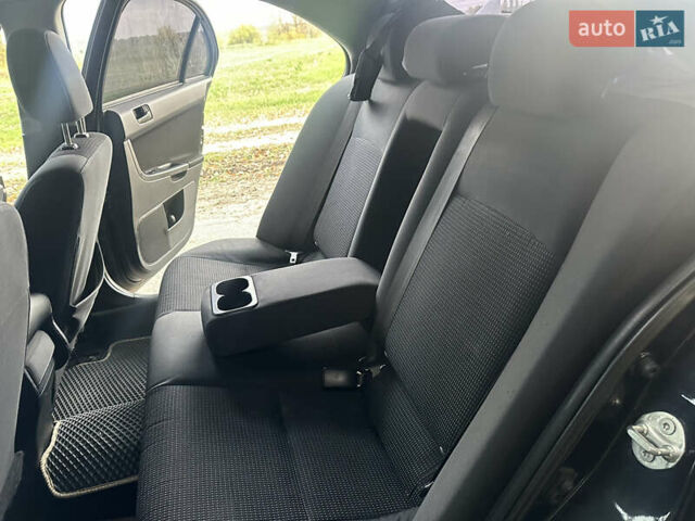 Черный Мицубиси Лансер, объемом двигателя 1.5 л и пробегом 202 тыс. км за 6500 $, фото 28 на Automoto.ua