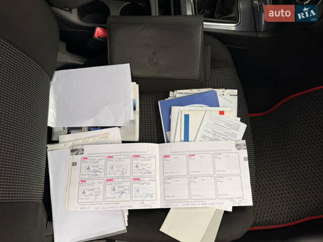 Черный Мицубиси Лансер, объемом двигателя 2 л и пробегом 169 тыс. км за 6800 $, фото 36 на Automoto.ua