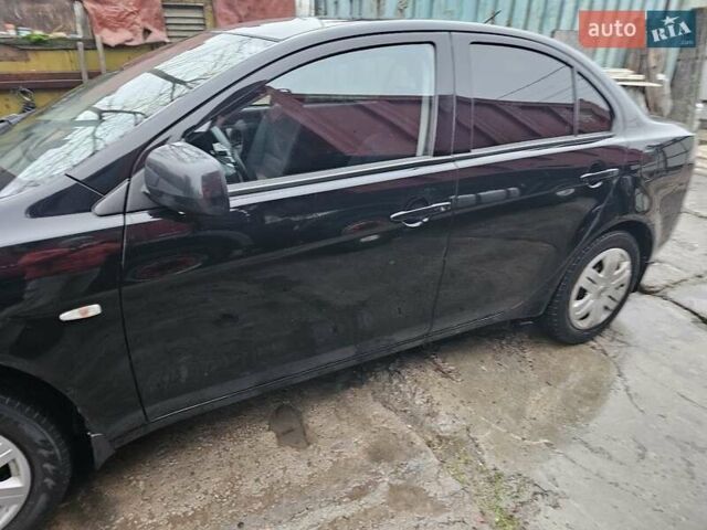 Черный Мицубиси Лансер, объемом двигателя 1.5 л и пробегом 222 тыс. км за 4900 $, фото 2 на Automoto.ua