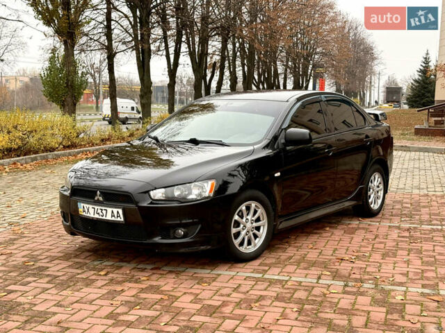Черный Мицубиси Лансер, объемом двигателя 2 л и пробегом 169 тыс. км за 6800 $, фото 11 на Automoto.ua