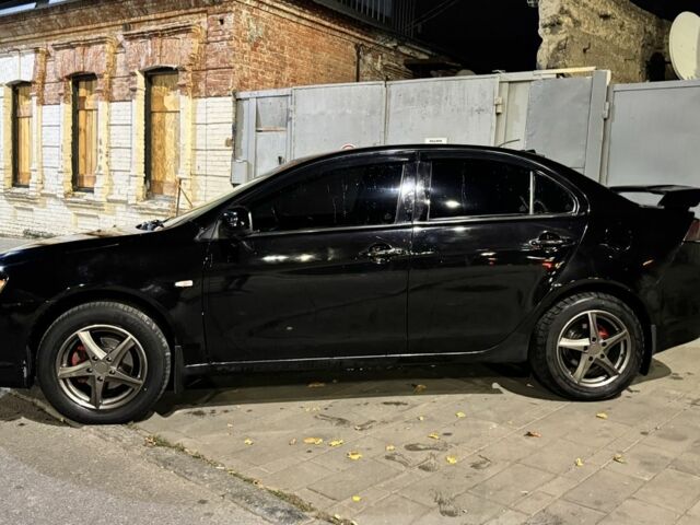 Чорний Міцубісі Lancer, об'ємом двигуна 1.5 л та пробігом 244 тис. км за 4700 $, фото 4 на Automoto.ua