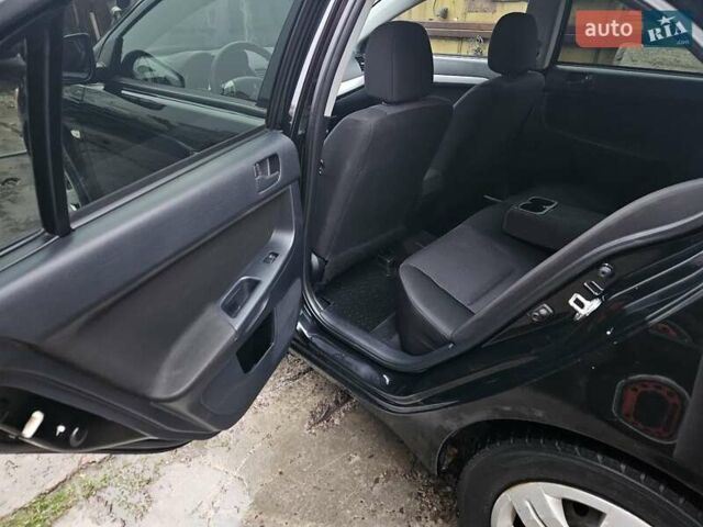 Черный Мицубиси Лансер, объемом двигателя 1.5 л и пробегом 222 тыс. км за 4900 $, фото 18 на Automoto.ua