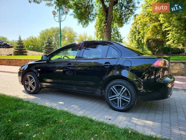 Чорний Міцубісі Lancer, об'ємом двигуна 1.5 л та пробігом 185 тис. км за 7300 $, фото 10 на Automoto.ua