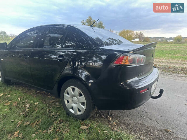 Черный Мицубиси Лансер, объемом двигателя 1.5 л и пробегом 202 тыс. км за 6500 $, фото 12 на Automoto.ua