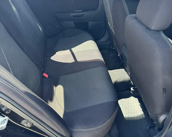 Черный Мицубиси Лансер, объемом двигателя 1.5 л и пробегом 230 тыс. км за 5400 $, фото 5 на Automoto.ua