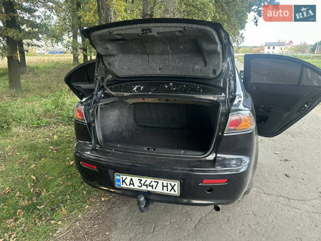 Черный Мицубиси Лансер, объемом двигателя 1.5 л и пробегом 202 тыс. км за 6500 $, фото 45 на Automoto.ua