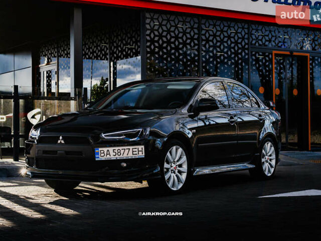 Чорний Міцубісі Lancer, об'ємом двигуна 2 л та пробігом 204 тис. км за 9500 $, фото 55 на Automoto.ua