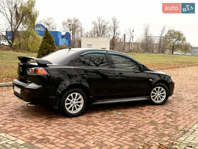 Черный Мицубиси Лансер, объемом двигателя 2 л и пробегом 169 тыс. км за 6800 $, фото 14 на Automoto.ua