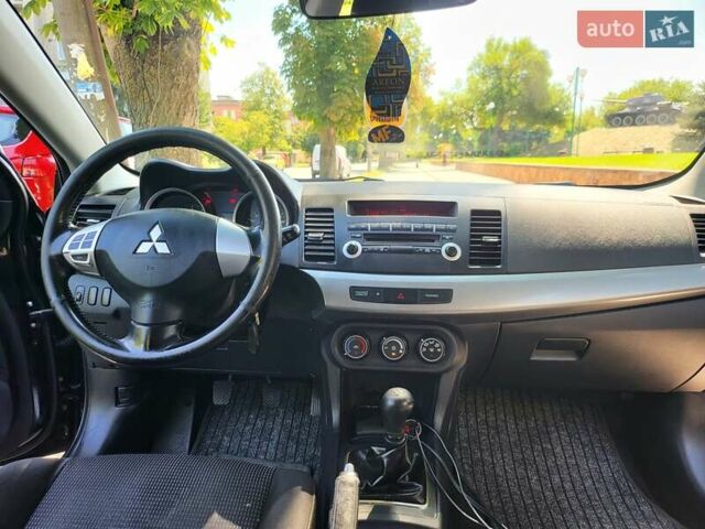 Чорний Міцубісі Lancer, об'ємом двигуна 1.5 л та пробігом 185 тис. км за 7300 $, фото 15 на Automoto.ua
