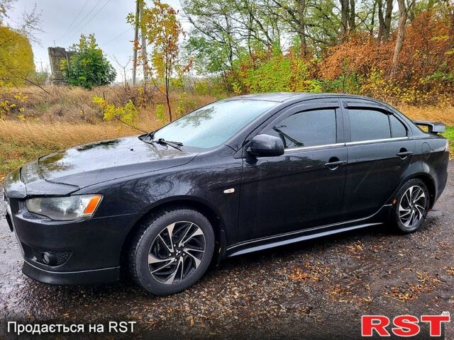 Чорний Міцубісі Lancer, об'ємом двигуна 1.5 л та пробігом 197 тис. км за 7500 $, фото 3 на Automoto.ua