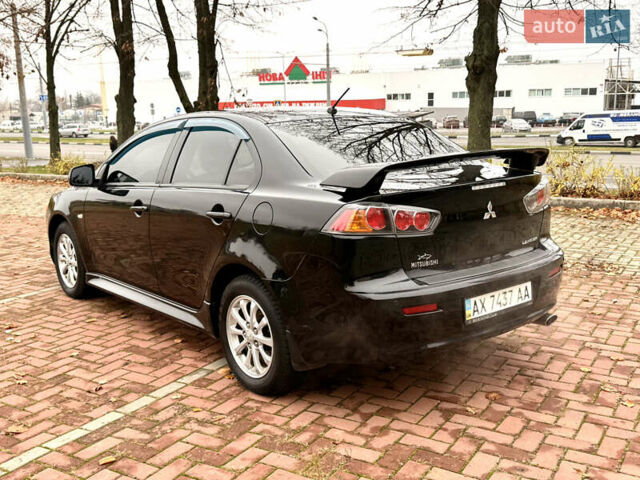 Черный Мицубиси Лансер, объемом двигателя 2 л и пробегом 169 тыс. км за 6800 $, фото 24 на Automoto.ua