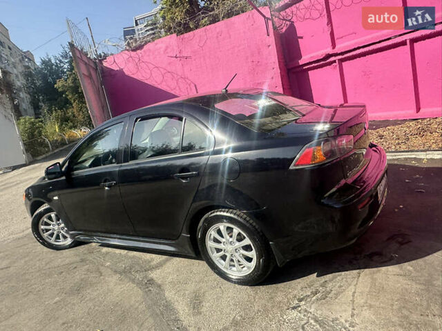 Черный Мицубиси Лансер, объемом двигателя 2 л и пробегом 158 тыс. км за 10800 $, фото 4 на Automoto.ua