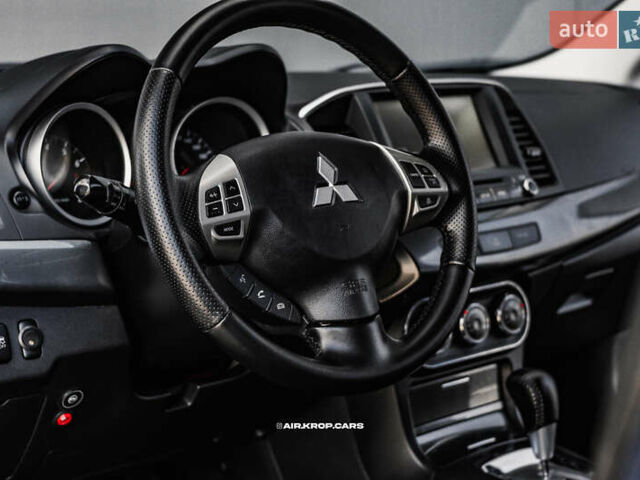 Чорний Міцубісі Lancer, об'ємом двигуна 2 л та пробігом 204 тис. км за 9500 $, фото 34 на Automoto.ua