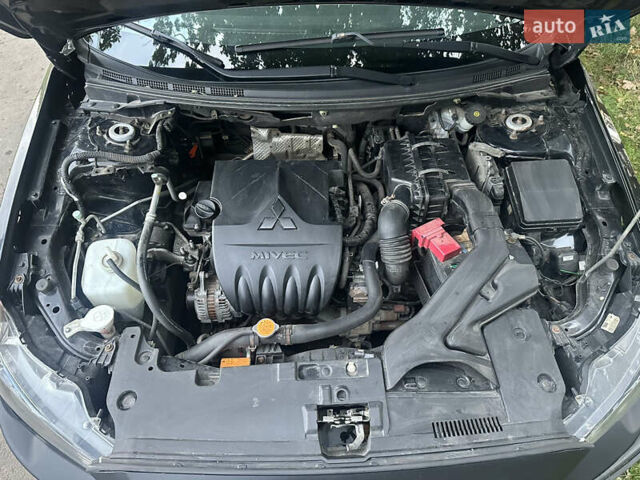 Черный Мицубиси Лансер, объемом двигателя 1.5 л и пробегом 202 тыс. км за 6500 $, фото 44 на Automoto.ua