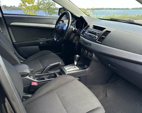 Чорний Міцубісі Lancer, об'ємом двигуна 1.5 л та пробігом 187 тис. км за 6800 $, фото 15 на Automoto.ua