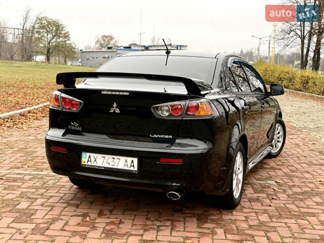 Черный Мицубиси Лансер, объемом двигателя 2 л и пробегом 169 тыс. км за 6800 $, фото 6 на Automoto.ua
