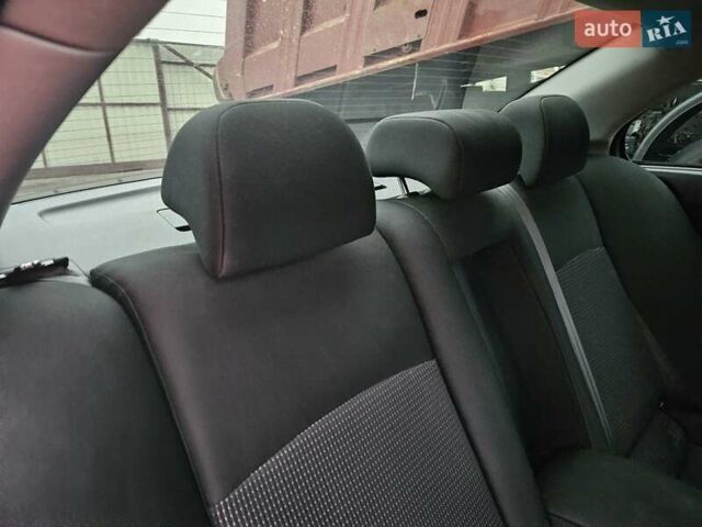 Черный Мицубиси Лансер, объемом двигателя 1.5 л и пробегом 222 тыс. км за 4900 $, фото 17 на Automoto.ua