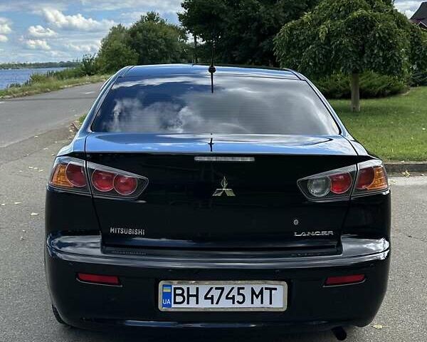 Чорний Міцубісі Lancer, об'ємом двигуна 1.5 л та пробігом 187 тис. км за 6800 $, фото 7 на Automoto.ua