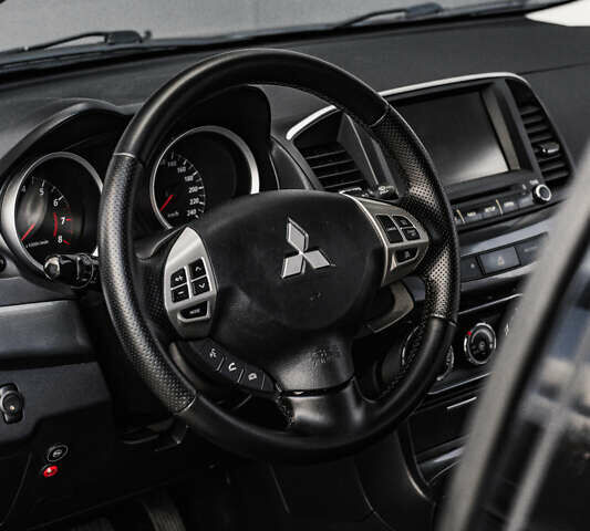 Чорний Міцубісі Lancer, об'ємом двигуна 2 л та пробігом 204 тис. км за 9500 $, фото 35 на Automoto.ua